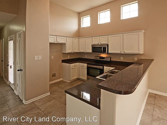 4th image of 7941 Baymeadow Cir N