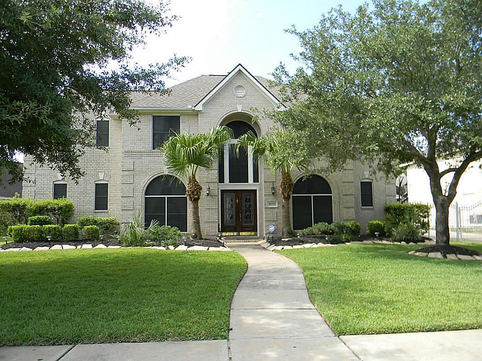 Home offers sprinkler system, gated drive way and solar screens.