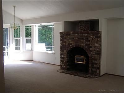 Living room with big fireplace