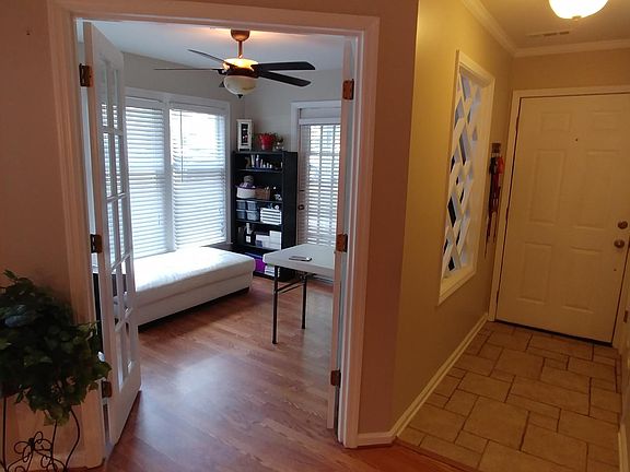 Sunroom and foyer with generous coat closet