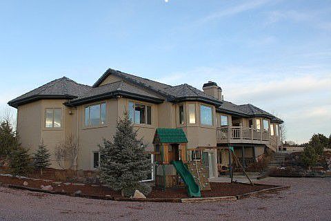 Walk out basment complete with wrap around driveway