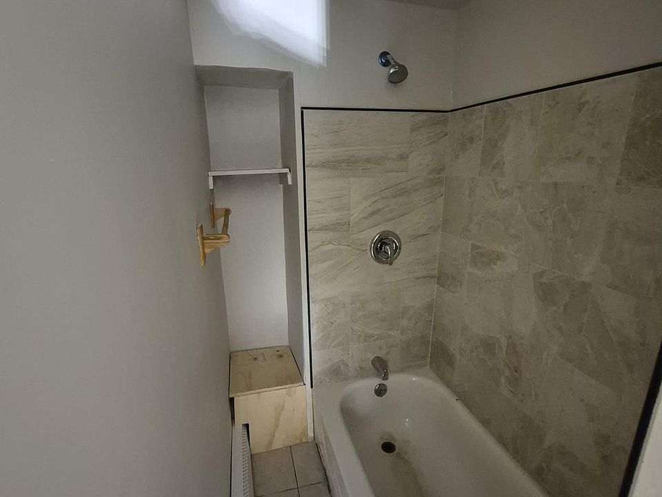 2nd level bath has a very narrow entry to shower.
