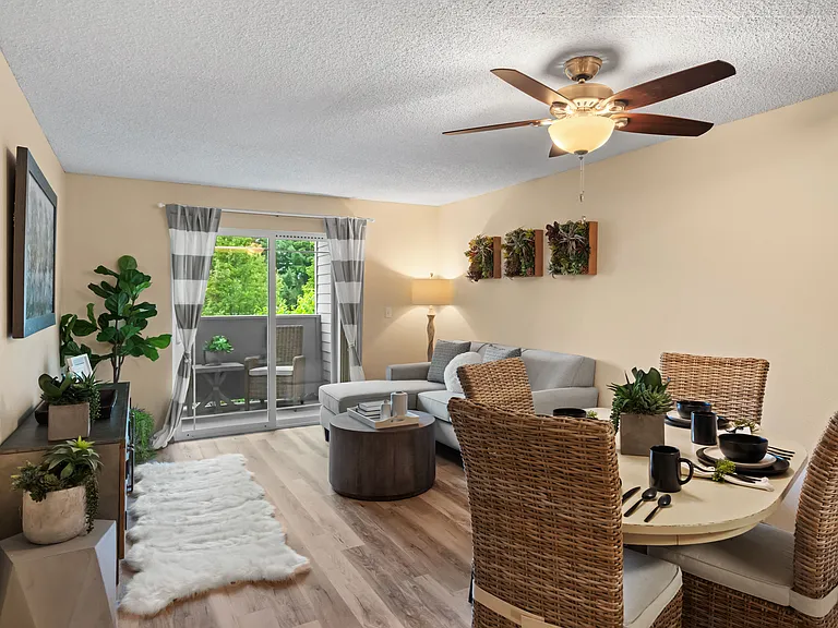Relax in this stylish living space featuring elegant decor and a tranquil balcony. Relax in this stylish living space featuring elegant decor and a tranquil balcony.