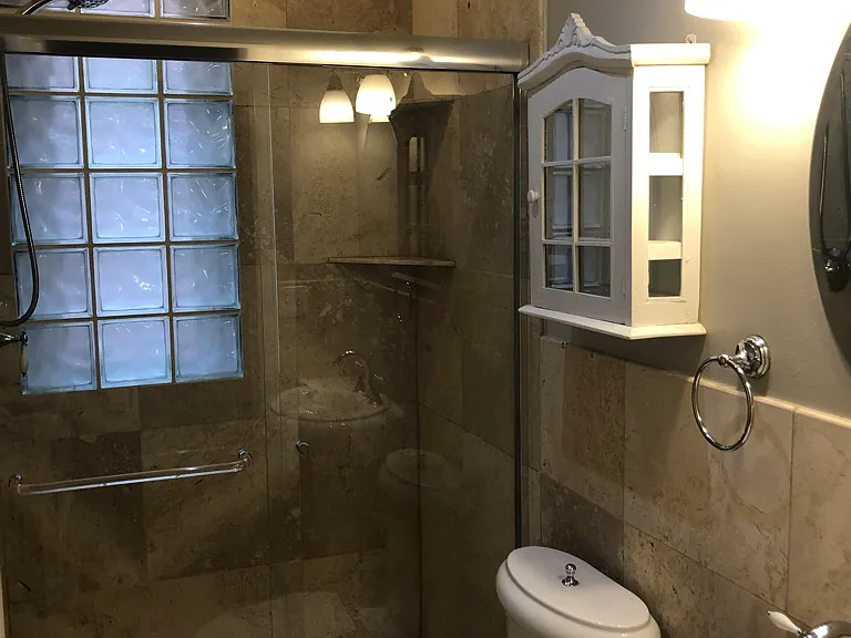 Main floor bath with stone tiles