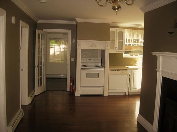 Dining area and kitchen, open door to bonus room, 2 bedroom