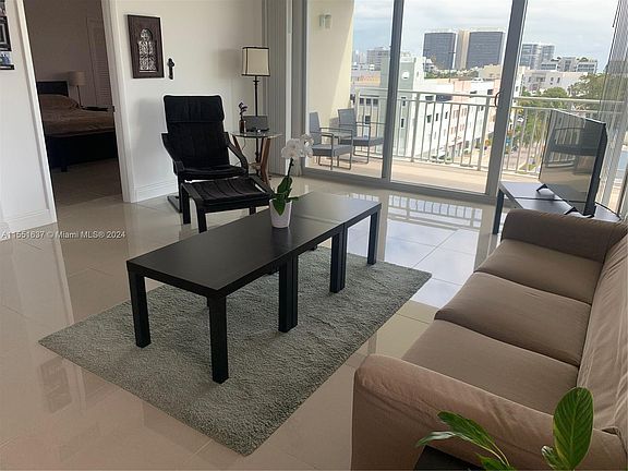 2nd image of 9500 W Bay Harbor Dr APT 7E