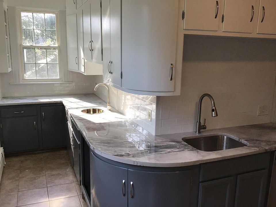Brand new kitchen with dedicated bar sink and storage