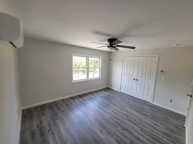 Master bedroom overlooks Main Ave.