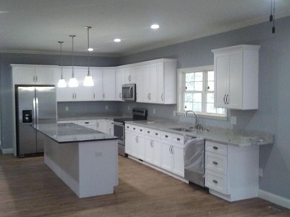 Kitchen with granite counter tops and huge island