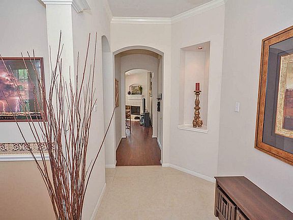 View of the foyer as you walk in the front door. Notice the upgraded tile