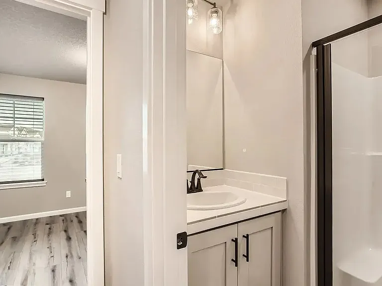 Bathroom with walk-in shower, toilet and sink. Oiled bronze fixtures throughout. Full bedroom with 2 closets. 

(Furnished pictures coming soon).