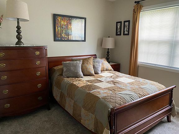 Full size bed, dresser night stand and desk in bedroom - full closet.