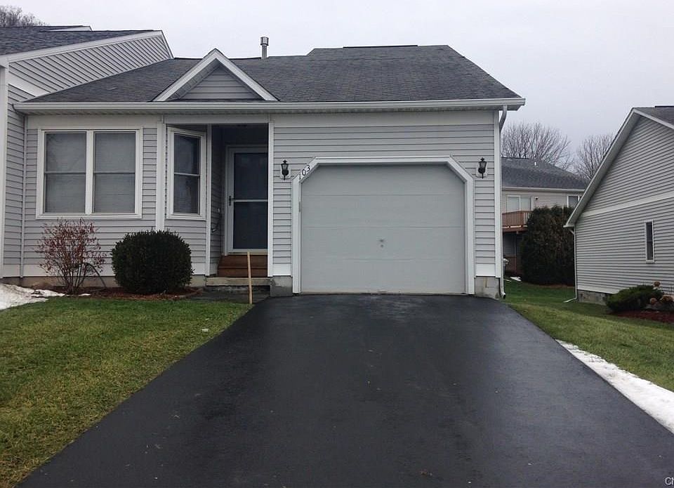 Front of town house.  Private parking with garage.