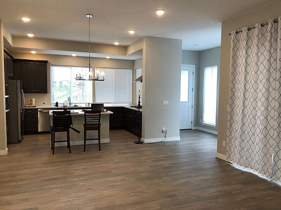 Open kitchen, dining and living area.