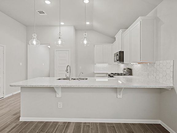 Abundant cabinet and counterspace
