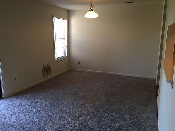 Living room/Dining room with Kitchen pass-thru to the right