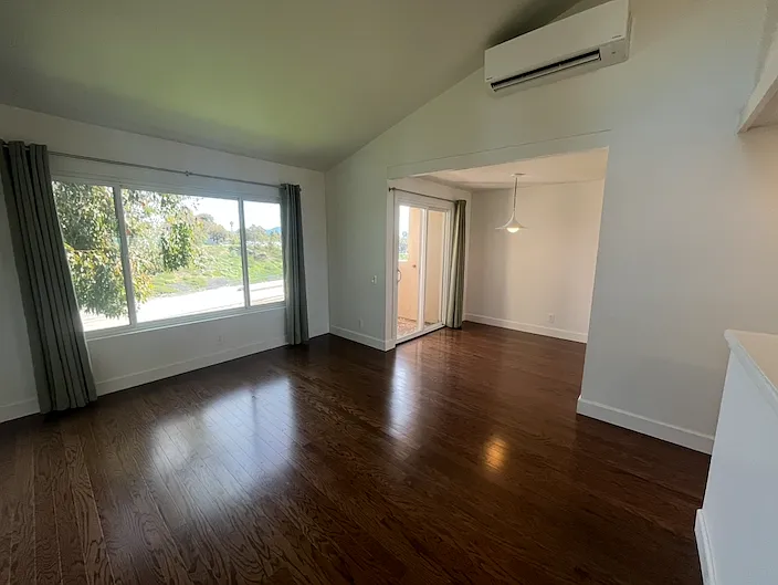 Living room featuring a brand-new Mini-Split for both heating and cooling. (Air-Conditioning)