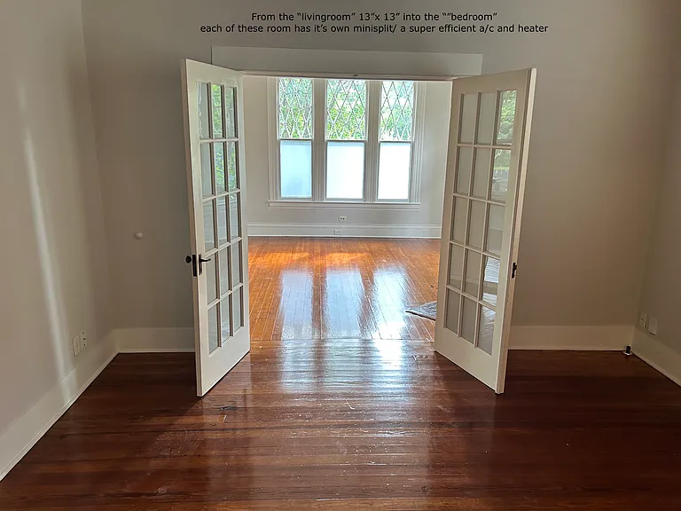 French doors separating the 15x13 bedroom from the 13x13 living room