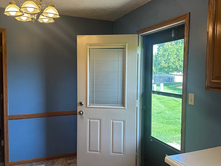 Dining area and door to back patio and community area.