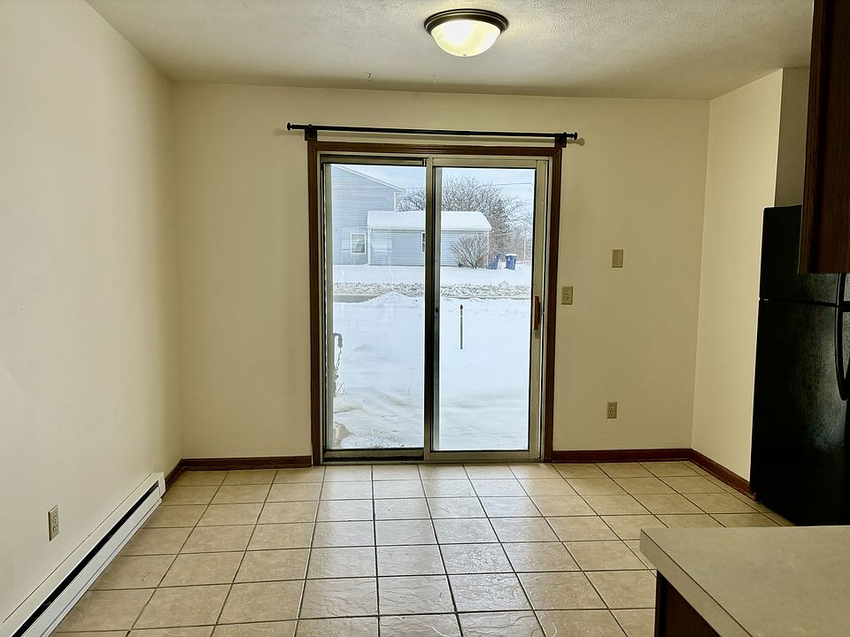 Kitchen with slider leading to patio.