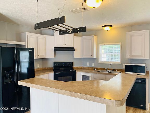 5th image of 7628 CREST Drive N