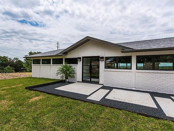 ONE OF A KIND CUSTOM FRONT DOOR MAKES FOR A GRAND ENTRY