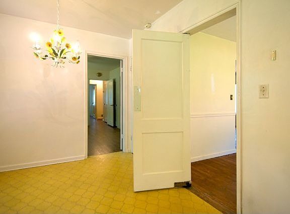 Cool vintage features like this swinging kitchen door