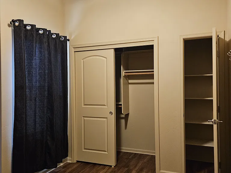 Second bedroom with full closet and linen closet