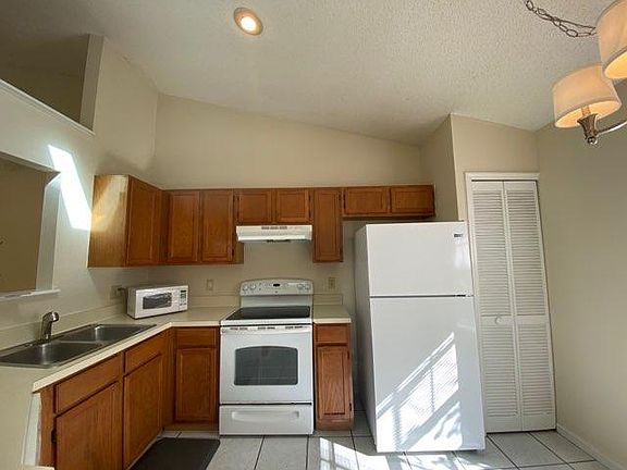 Kitchen with kitchen mat