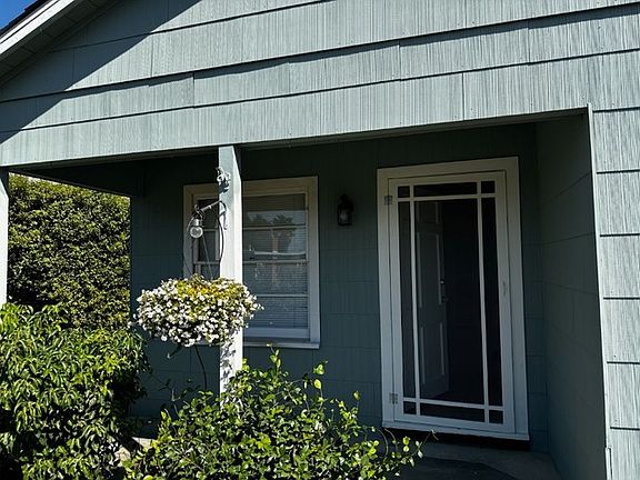 Closeup of the porch -- room enough for two chairs.