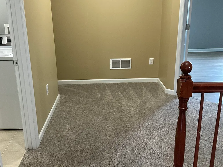Loft area connecting master bedroom and laundry
