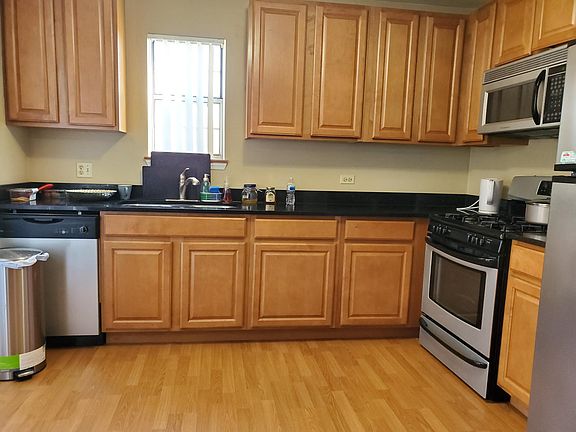 Fully updated kitchen with granite countertop and stainless steel appliances