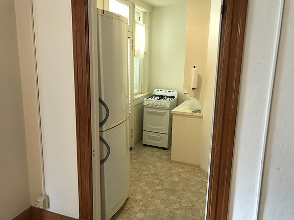 Kitchen. Frig and stove.
