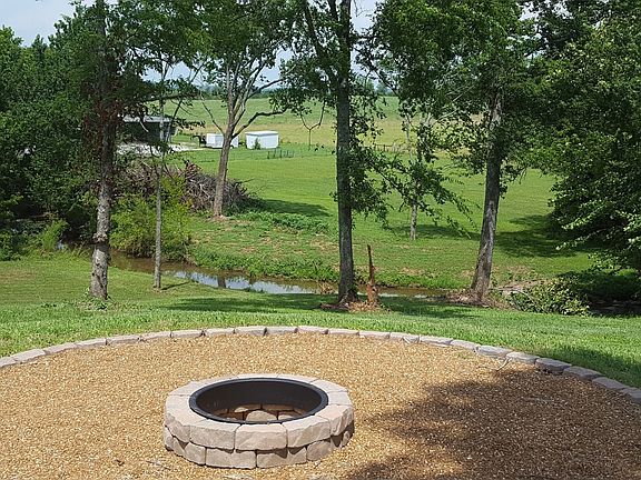 Firepit overlooking creek