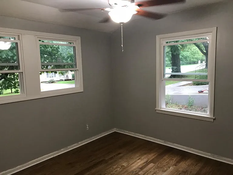 2nd Bedroom with new refinished floors, windows and paint!