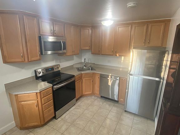 Kitchen with stainless steel appliances.