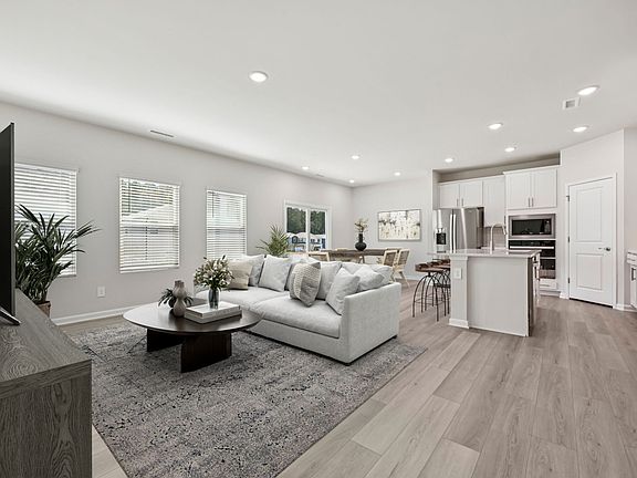 Great room in the Chatham floorplan at a Meritage Homes community in Garner, NC.