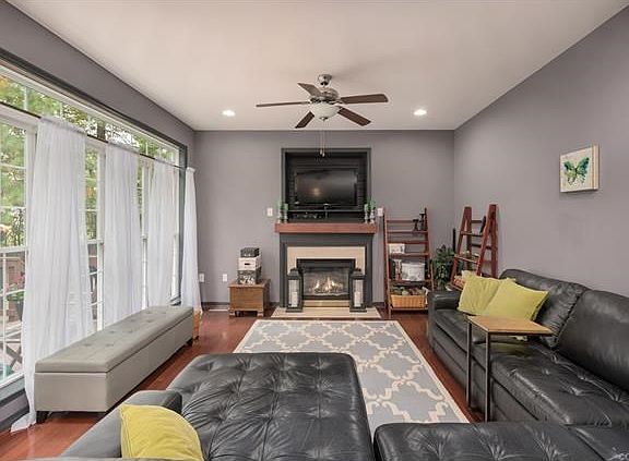 Another shot of the Great Room which opens to eat-in area and kitchen. Lots of transoms downstairs for natural light.