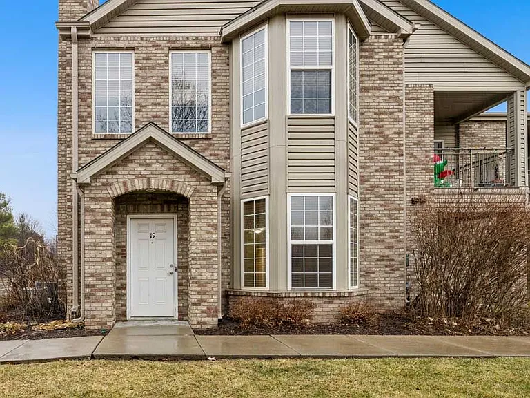 Welcoming entrances and classic brick exteriors create a warm first impression that makes coming home feel easy at the end of the day.