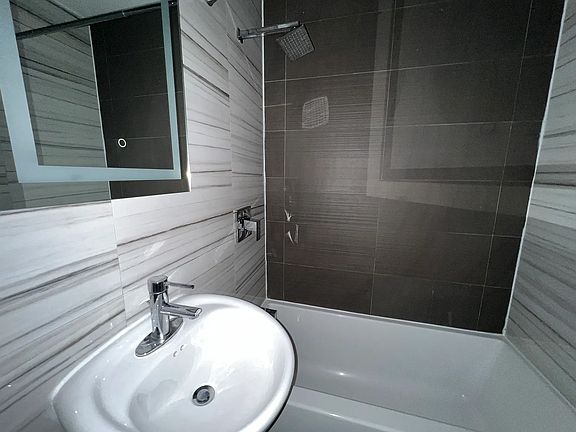 5th image of 411 E 118th St APT 12