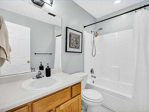 Third bath with oversize vanity mirror