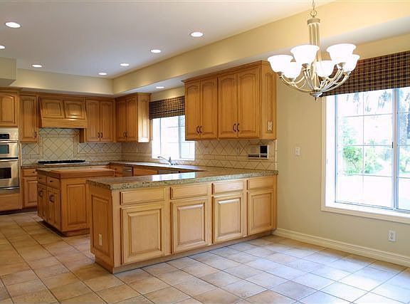Open Kitchen Looks out to Back Yard