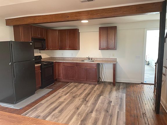 Kitchen, Cherry cabinets, wood beams, hardwood floors