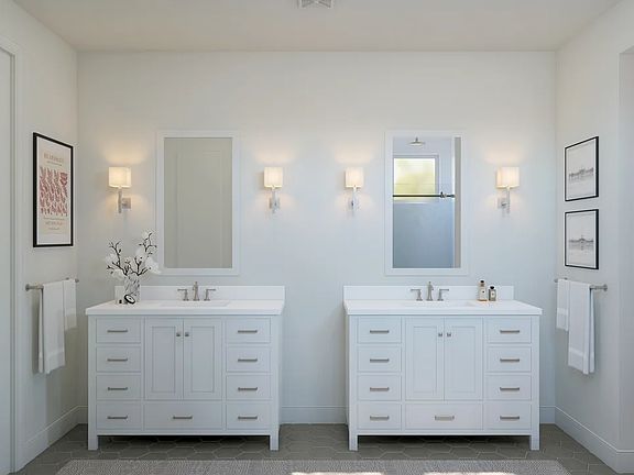 Primary bath with dual freestanding vanities