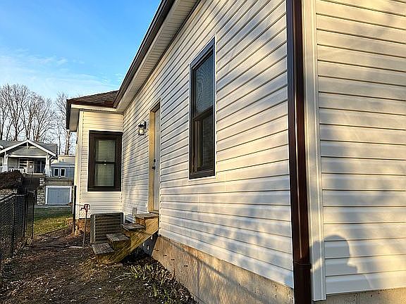 New siding gutters & windows