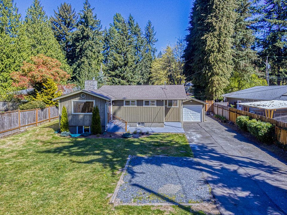 Welcome home! Front entrance with attached one car garage.