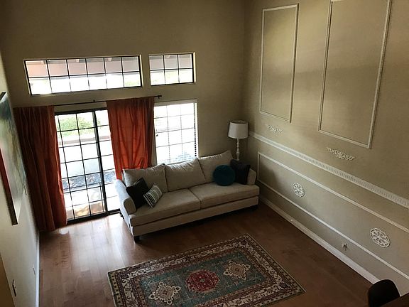 overlooking front room and patio from dining area.