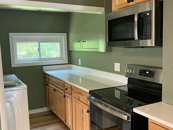 Washer / Dryer on left.