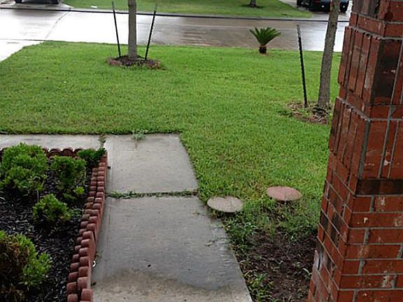 view of entrance and neighbors homes