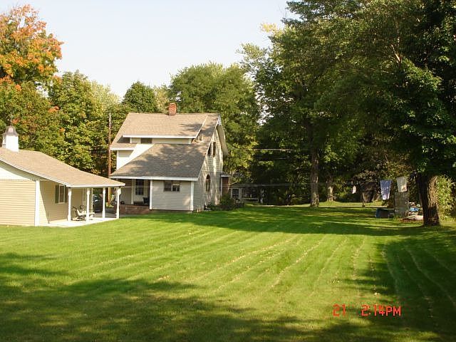 large flat back and side yard!